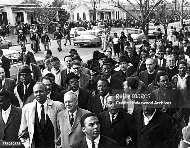 Dr Martin Luther King leads a voter protest march, Selma, Alabama, March 9, 1965. Behind him is Reverend Ralph D Abernathy and King's aide Andrew...