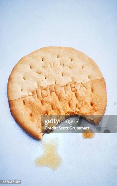 broken dunked rich tea biscuit - tea stock pictures, royalty-free photos & images