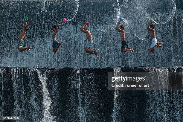 jump for fun - synchronized swimming stock pictures, royalty-free photos & images