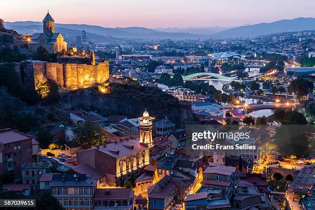 view of tbilisi (georgia) at dusk - 21st century stock pictures, royalty-free photos & images
