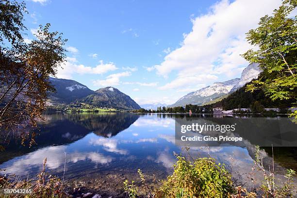 reflections on the lake grundlsee, austria. - grundlsee stock pictures, royalty-free photos & images