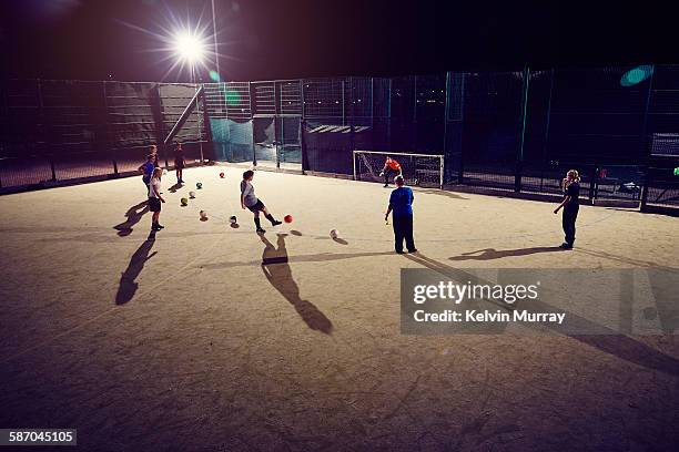 women's football team shooting during training - football training stock-fotos und bilder