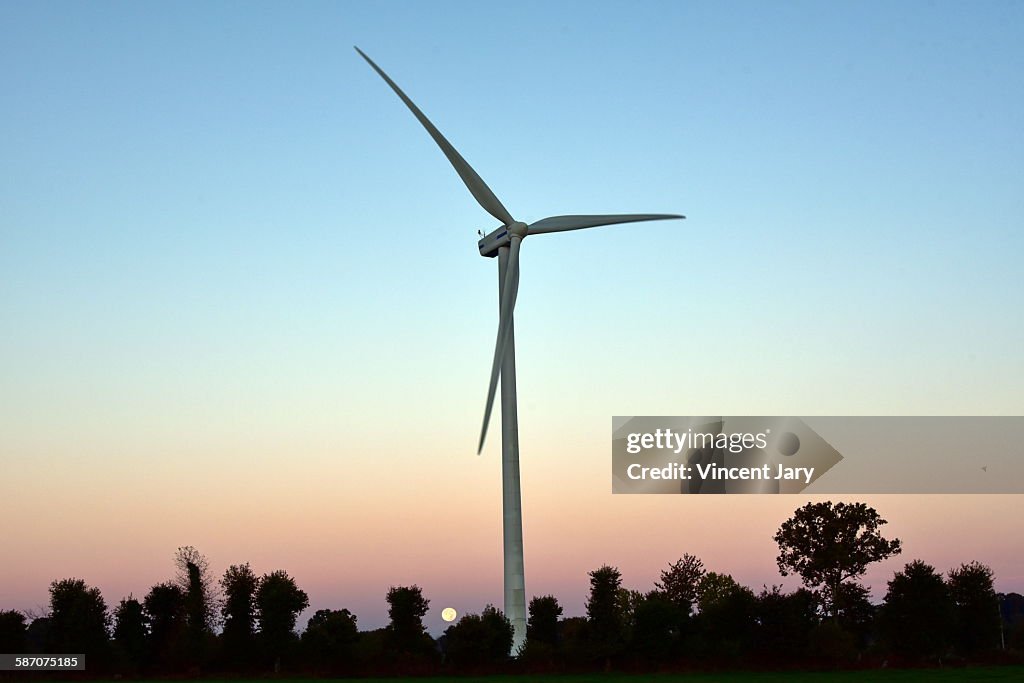 Rural landscape with wind turbine in France