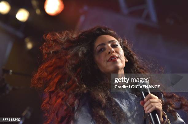Member of Israeli band A-WA performs during the Festival du Bout du Monde music festival, on August 7, 2016 in Crozon, western France. / AFP PHOTO /...