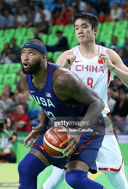 DeMarcus Cousins of USA and Di Wu of China in action during the group phase basketball match between USA and China on day 1 of the Rio 2016 Olympic...