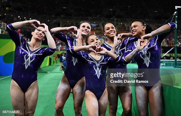 Team Brazil celebrates their performance after Women's qualification for Artistic Gymnastics on Day 2 of the Rio 2016 Olympic Games at the Rio...