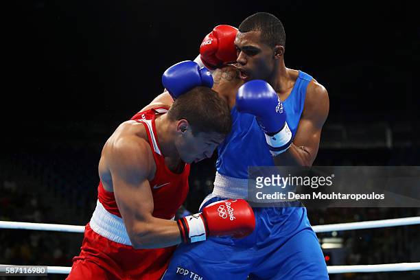 Albert Ramon Ramirez of Venezuela competes against Petr Khamukov of Russia in the Men's Light Heavy 81kg bout on Day 2 of the Rio 2016 Olympic Games...