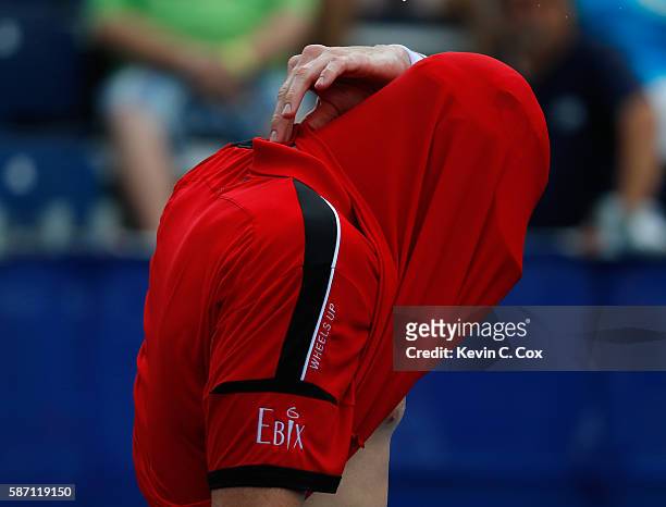 John Isner reacts after losing a game to Nick Kyrgios of Australia during the finals of the BB&T Atlanta Open at Atlantic Station on August 7, 2016...