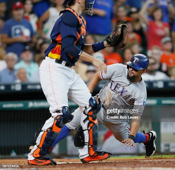 Rougned Odor of the Texas Rangers scores in the fifth inning on a double by Jonathan Lucroy at Minute Maid Park on August 7, 2016 in Houston, Texas.