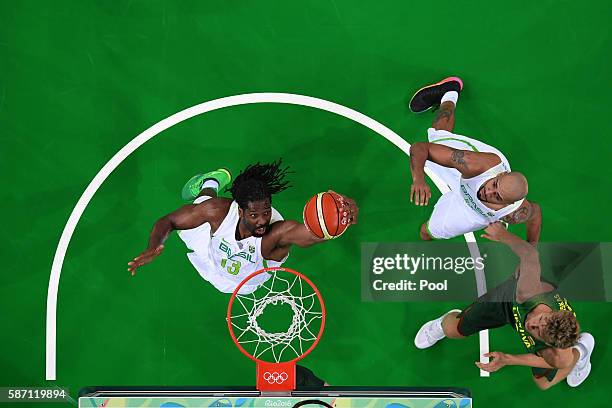 Nene Hilario of Brazil shoots during a Men's preliminary round basketball game between Brazil and Lithuania on Day 2 of the Rio 2016 Olympic Games at...