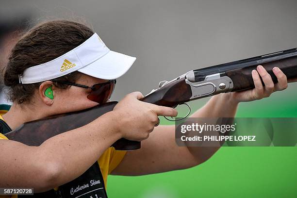 Gold medal winner Australia's Catherine Skinner competes in the women's trap event at the Rio 2016 Olympic Games at the Olympic Shooting Centre in...