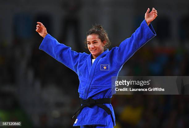 Majlinda Kelmendi of Kosovo celebrates winning the gold medal against Odette Giuffrida of Italy during the Womens -52kg gold medal final on Day 2 of...