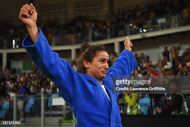 Majlinda Kelmendi of Kosovo shows her emotions as she celebrates winning the gold medal against Odette Giuffrida of Italy during the Womens -52kg...