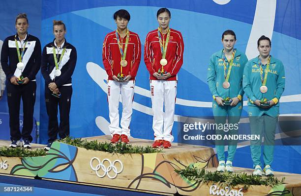Silver medallists Italy's Francesca Dallape and Tania Cagnotto, gold medallists China's Shi Tingmao and Wu Minxia, bronze medallists Australia's...