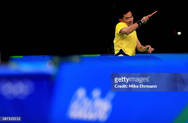 Lei Kou of Ukraine plays a Men's Singles second round match against Omar Assar of Egypt on Day 2 of the Rio 2016 Olympic Games at Riocentro -...