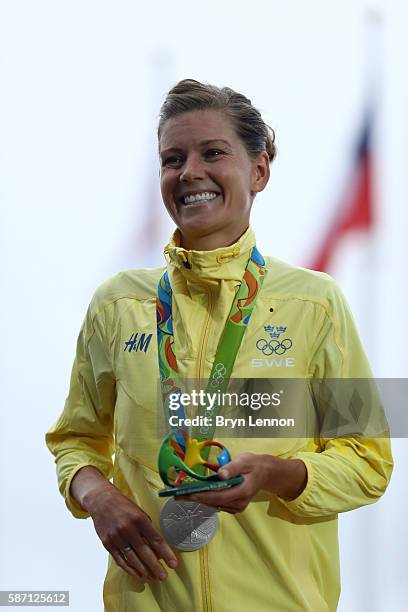 Silver medalist Emma Johansson of Sweden celebrates after the Women's Road Race on Day 2 of the Rio 2016 Olympic Games at Fort Copacabana on August...