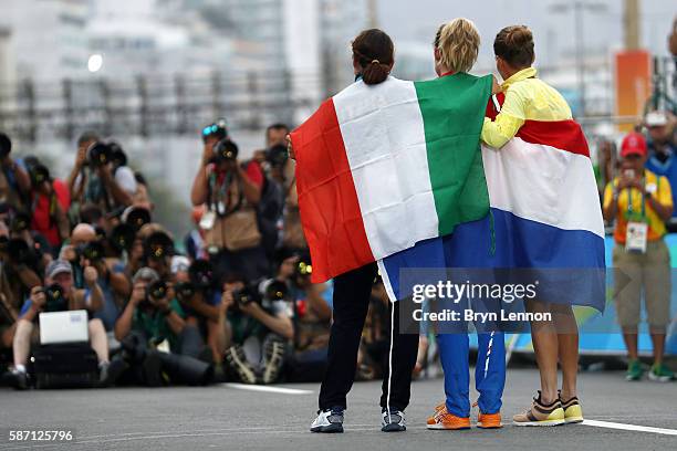 From left, bronze medalist Elisa Longo Borghini of Italy, gold medalist Anna van der Breggen of the Netherlands and silver medalist Emma Johansson of...