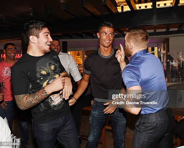 Dillon Danis, Cristiano Ronaldo and Connor McGregor attend Jennifer Lopez's birthday at Nobu Villa Atop Nobu Hotel at Caesars Palace on July 24, 2016...