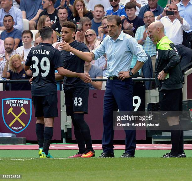 Josh Cullen is subbed off for Marcus Browne of West Ham United at London Stadium on Queen Elizabeth Olympic Park during the friendly match between...