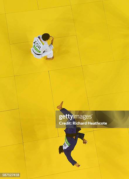 Fabio Basile of Italy performs a flip as he celebrates winning the gold medal against Baul An of Korea during the Men's -66kg gold medal final on Day...