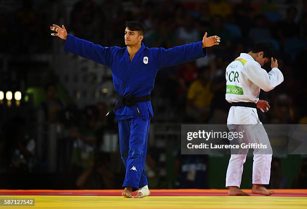 Fabio Basile of Italy celebrates winning the gold medal against Baul An of Korea during the Men's -66kg gold medal final on Day 2 of the Rio 2016...