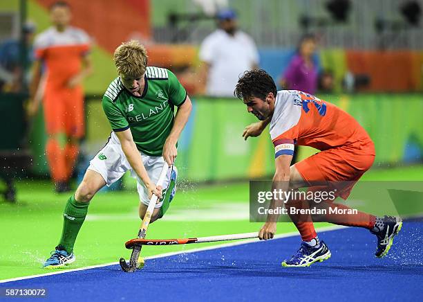 Rio , Brazil - 7 August 2016; Kirk Shimmins of Ireland in action against Robert van der Horst of Netherlands during their Pool B match at the Olympic...