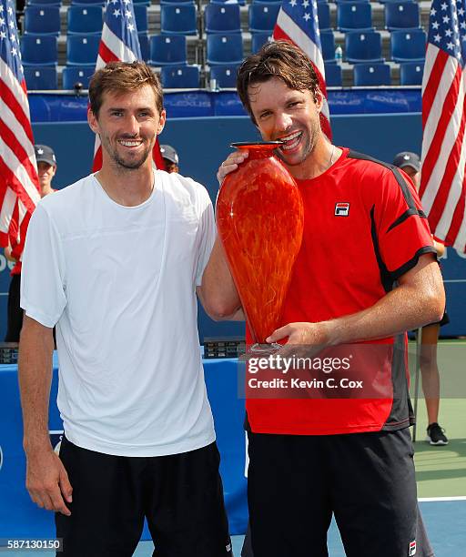 Horacio Zeballos and Andres Molteni of Argentina pose with the trophy after defeating Johan Brunstrom and Andreas Siljestrom of Sweden during the...