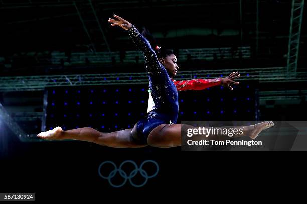 Simone Biles of the United States competes on the balance beam during Women's qualification for Artistic Gymnastics on Day 2 of the Rio 2016 Olympic...