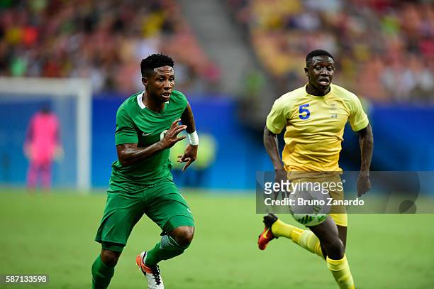 Imoh Ezekiel player of Nigeria competes for the ball with Pa Konate player of Sweden during 2016 Summer Olympics match between Sweden and Nigeria at...