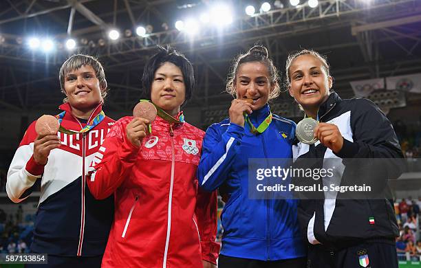 Silver medalist Odette Giuffrida of Italy, gold medalist Majlinda Kelmendi of Kosovo and bronze medalists Misato Nakamura of Japan and Natalia...
