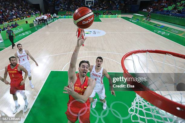 Pau Gasol of Spain shoots the ball against Croatia during a Men's preliminary round basketball game between Croatia and Spain on Day 2 of the Rio...