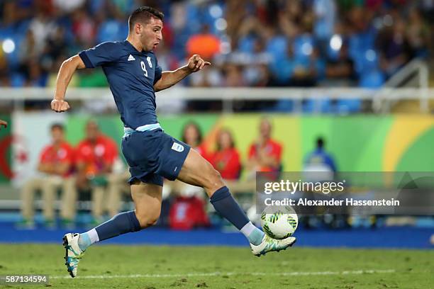 Jonathan Calleri of Argentina battles for the ball during the Men's Group D first round match between Argentina and Algeria during the Rio 2016...