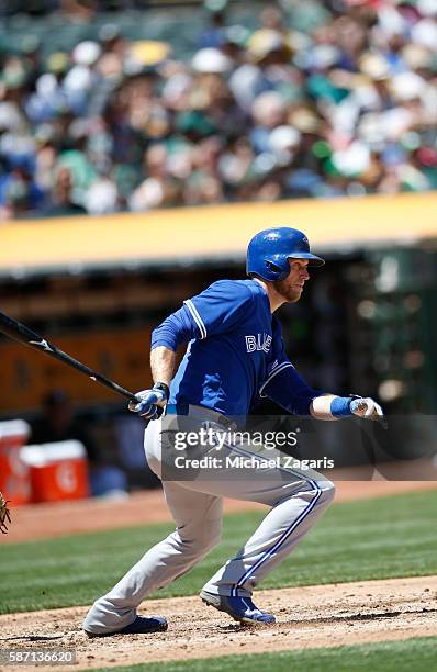 Josh Thole of the Toronto Blue Jays bats during the game against the Oakland Athletics at the Oakland Coliseum on July 16, 2016 in Oakland,...