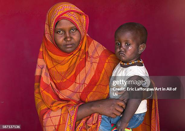 Afar tribe woman with her child, afar region, semera, Ethiopia on February 29, 2016 in Semera, Ethiopia.