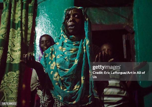 Sufi women go into a trance during a ceremony, harari region, harar, Ethiopia on March 4, 2016 in Harar, Ethiopia.