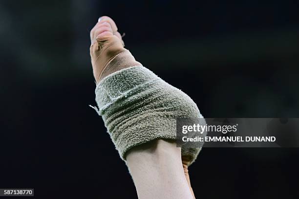 Gymnast competes in the qualifying for the women's Beam event of the Artistic Gymnastics at the Olympic Arena during the Rio 2016 Olympic Games in...