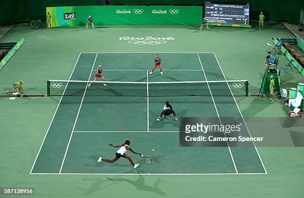 Serena and Venus Williams of the USA in action against Lucie Safarova and Barbora Strycova of the Czech Republic in their doubles match on Day 2 of...