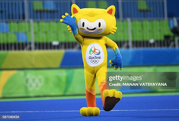 One of the Olympic mascots, Vinicius, walks onto the field in a break during the men's field hockey Australia vs Spain match of the Rio 2016 Olympics...