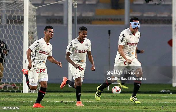 Hernan Rengifo of Universitario celebrates the second goal of his team against Sporting Cristal during a match between Universitario and Sporting...