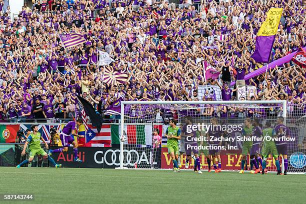August 07: Seb Hines heads the ball past the Seattle Sounders defense to give Orlando an early first half lead at Citrus Bowl on August 07, 2016 in...