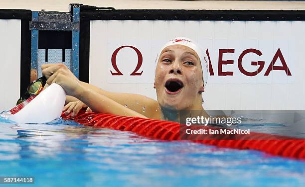 Penny Oleksiak of Canada elebrates after she wins silver in the Women's 100m Butterfly final during Day 2 of the Rio 2016 Olympic Games at Olympic...