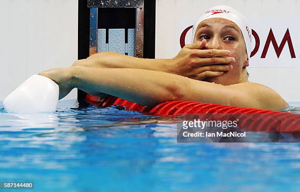 Penny Oleksiak of Canada celebrates after she wins silver in the Women's 100m Butterfly final during Day 2 of the Rio 2016 Olympic Games at Olympic...