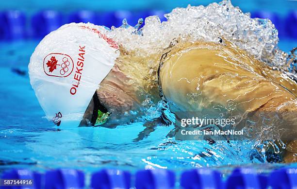 Penny Oleksiak of Canada on her way to winning silver in the Women's 100m Butterfly final during Day 2 of the Rio 2016 Olympic Games at Olympic...