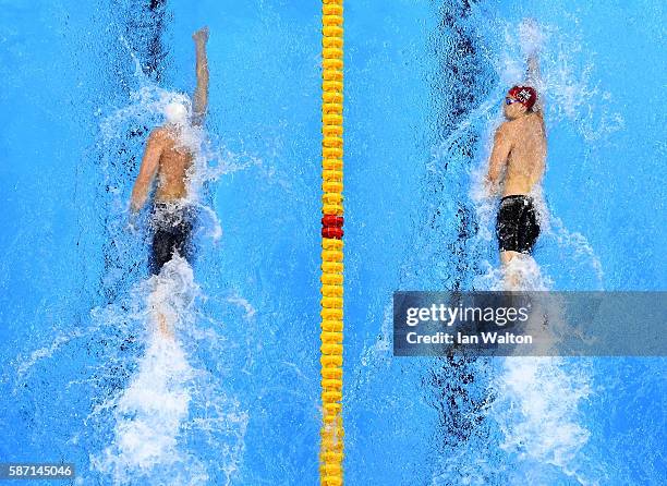 Paul Biedermann of Germany and James Guy of Great Britain compete in the first Semifinal of the Men's 200m Freestyle on Day 2 of the Rio 2016 Olympic...