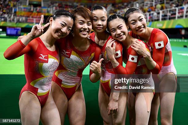 Asuka Teramoto, Mai Murakami, Sae Miyakawa, Aiko Sugihara and Yuki Uchiyama of Japan pose for photographs after the Women's qualification for...