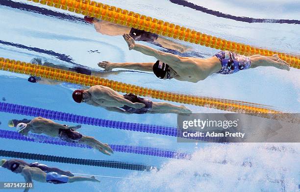 Cody Miller of the United States, Adam Peaty of Great Britain, Cameron van der Burgh of South Africa and Kevin Cordes of the United States compete in...