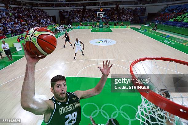 Argentina's shooting guard Patricio Garino takes a shot during a Men's round Group B basketball match between Nigeria and Argentina at the Carioca...