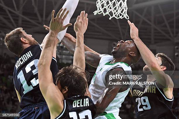 Argentina's small forward Andres Nocioni, Argentina's centre Marcos Delia, Nigeria's small forward Al-Farouq Aminu and Argentina's shooting guard...