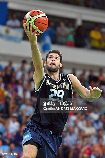 Argentina's shooting guard Patricio Garino goes to the basket during a Men's round Group B basketball match between Nigeria and Argentina at the...