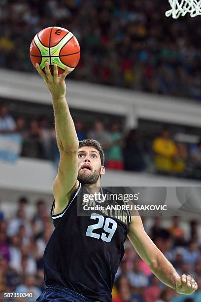 Argentina's shooting guard Patricio Garino goes to the basket during a Men's round Group B basketball match between Nigeria and Argentina at the...